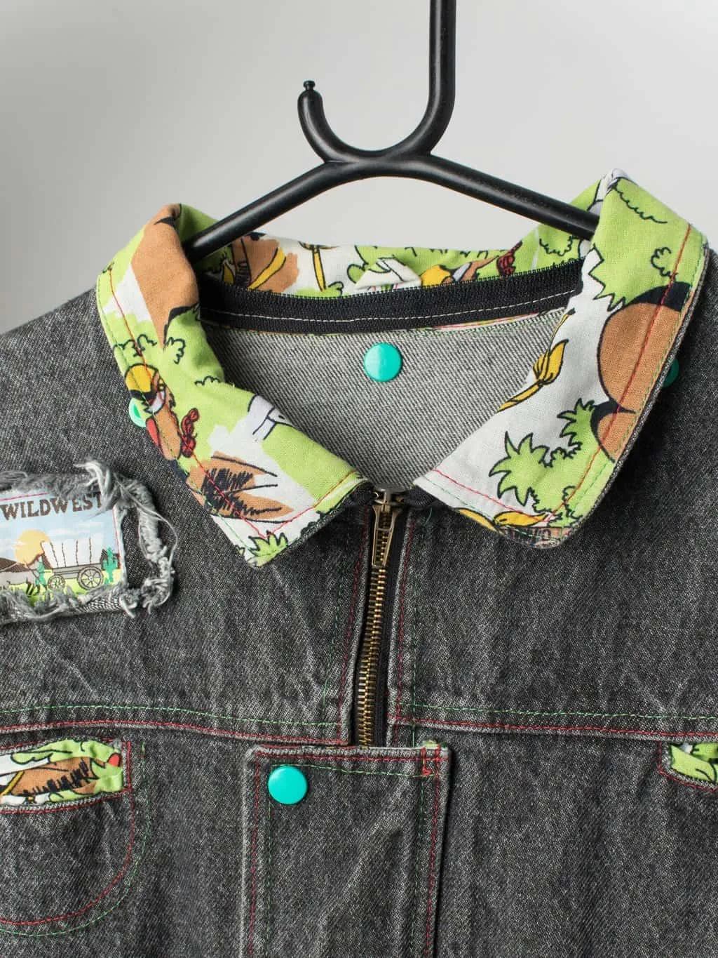 Vintage grey denim jacket with colourful patches – XS