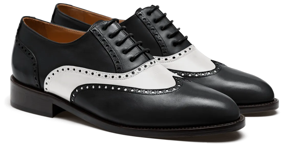  Zapatos Brogue en piel blanco y negro